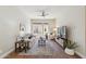 Cozy living room features hardwood floors, comfortable seating, and courtyard views at 22469 N 79Th Pl, Scottsdale, AZ 85255
