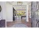 Open-concept living room featuring hardwood floors and large windows at 22469 N 79Th Pl, Scottsdale, AZ 85255