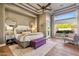 Bright main bedroom with hardwood floors, recessed ceiling and view to the outside at 22469 N 79Th Pl, Scottsdale, AZ 85255
