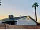 Lovely home featuring desert landscaping, block wall fencing, and a well-maintained roof at 2459 E Baltimore St, Mesa, AZ 85213