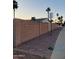 Well-maintained property with block wall fencing and desert landscaping along a sidewalk at 2459 E Baltimore St, Mesa, AZ 85213