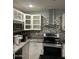 Modern kitchen showcasing granite countertops and stainless steel appliances at 2459 E Baltimore St, Mesa, AZ 85213