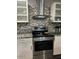 Modern kitchen featuring granite countertops and stainless steel appliances at 2459 E Baltimore St, Mesa, AZ 85213