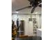 Bright kitchen featuring stainless steel refrigerator and ample white cabinet space at 2459 E Baltimore St, Mesa, AZ 85213