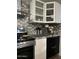Modern kitchen showcasing granite countertops and stainless steel appliances at 2459 E Baltimore St, Mesa, AZ 85213