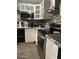 Modern kitchen showcasing granite countertops and stainless steel appliances at 2459 E Baltimore St, Mesa, AZ 85213