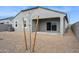 This home features a cozy backyard with low maintenance desert landscaping and a covered patio at 25473 W Graham Trl, Buckeye, AZ 85326