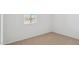 Cozy bedroom with a window and neutral color palette at 25473 W Graham Trl, Buckeye, AZ 85326