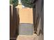 Outdoor air conditioning unit surrounded by walls at 2618 S 81St Ln, Phoenix, AZ 85043