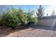 Gravel backyard featuring trees at 2618 S 81St Ln, Phoenix, AZ 85043
