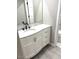 Bathroom vanity has a white countertop and a white cabinet at 2618 S 81St Ln, Phoenix, AZ 85043