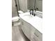Bathroom vanity features a white countertop and modern black faucet at 2618 S 81St Ln, Phoenix, AZ 85043