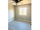 Bedroom with neutral paint, ceiling fan and luxury vinyl flooring at 2618 S 81St Ln, Phoenix, AZ 85043