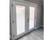Double doors with built-in blinds offer privacy and style at 2618 S 81St Ln, Phoenix, AZ 85043