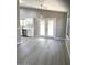 Well-lit kitchen area with white cabinets and stainless steel appliances at 2618 S 81St Ln, Phoenix, AZ 85043