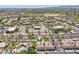 Stunning aerial view of a well-situated property near a shopping center with convenient access to roads and stunning mountain views at 2801 N Litchfield Rd # 37, Goodyear, AZ 85395