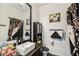 Modern bathroom with black cabinets, white countertops, an ornate mirror, and luxury finishes at 2801 N Litchfield Rd # 37, Goodyear, AZ 85395