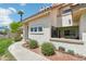 Charming single-story home featuring a beautifully landscaped yard and a cozy front patio at 2801 N Litchfield Rd # 37, Goodyear, AZ 85395