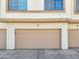Exterior shot of the garage doors with unit numbers on a sunny day at 2801 N Litchfield Rd # 37, Goodyear, AZ 85395