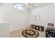 Loft area features carpet flooring, a vaulted ceiling, and a decorative rug at 2801 N Litchfield Rd # 37, Goodyear, AZ 85395