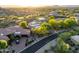 Beautiful aerial shot of a home with desert landscaping, offering an inviting outdoor living space at 29412 N 108Th Pl, Scottsdale, AZ 85262
