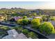 Aerial perspective of a neighborhood, featuring desert landscaping and a luxury home at 29412 N 108Th Pl, Scottsdale, AZ 85262