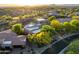 Scenic aerial shot showcasing the desert home's architecture and verdant surroundings at 29412 N 108Th Pl, Scottsdale, AZ 85262