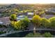 Aerial view of a luxury home featuring a unique design and desert landscaping at 29412 N 108Th Pl, Scottsdale, AZ 85262