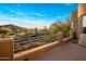 Breathtaking balcony with beautiful golf course views, desert vegetation, and a stunning blue sky at 29412 N 108Th Pl, Scottsdale, AZ 85262
