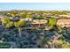 Expansive estate home with desert landscaping and a circular design, offering exceptional privacy and views at 29412 N 108Th Pl, Scottsdale, AZ 85262