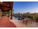 Inviting backyard pool area with lounge chairs, desert landscaping, and mountain views at 29412 N 108Th Pl, Scottsdale, AZ 85262