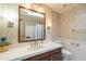 Bathroom with a vanity, sink, mirror, toilet, and shower with curtain at 3109 N 81St St, Scottsdale, AZ 85251