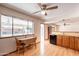 Eat-in kitchen features hardwood floors, granite countertops, and bright natural light at 3109 N 81St St, Scottsdale, AZ 85251
