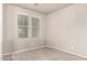 Bright empty bedroom featuring neutral walls, carpet, and two sunny windows at 3706 E Yeager Dr, Gilbert, AZ 85295