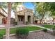 Beautifully landscaped front yard featuring green grass, mature trees, and a walkway at 3706 E Yeager Dr, Gilbert, AZ 85295