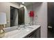 Stylish bathroom vanity with granite countertop, modern fixtures, and elegant decor at 39810 N 105Th Way # 128, Scottsdale, AZ 85262