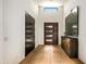 Bright foyer featuring hardwood floors and a contemporary front door at 39810 N 105Th Way # 128, Scottsdale, AZ 85262