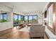 Bright living room with floor-to-ceiling windows offering expansive desert views at 39810 N 105Th Way # 128, Scottsdale, AZ 85262