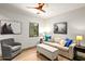 Cozy living room with natural light, comfortable seating, and stylish decor at 39810 N 105Th Way # 128, Scottsdale, AZ 85262