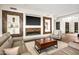 Comfortable living room with a fireplace and modern decor, perfect for relaxation at 39810 N 105Th Way # 128, Scottsdale, AZ 85262