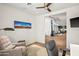 Comfortable home office featuring desk, chair, accent chair, and desert landscape views at 39810 N 105Th Way # 128, Scottsdale, AZ 85262