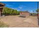 Backyard featuring a shed, patio area and plenty of space at 4349 W Morten Ave, Glendale, AZ 85301