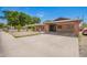 Attractive single-story home with brick accents, carport, and a sunny front yard at 4349 W Morten Ave, Glendale, AZ 85301