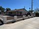 Single-story home features a tidy front yard with a quaint fence and large covered area at 4716 S Fair Nw Ln, Tempe, AZ 85282