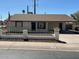 Inviting single-story home featuring a tidy front yard and a quaint white fence at 4716 S Fair Nw Ln, Tempe, AZ 85282