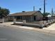 Inviting single-story home featuring a tidy front yard and a quaint white fence at 4716 S Fair Nw Ln, Tempe, AZ 85282