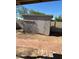 A storage shed offers ample outdoor storage space for tools and equipment in the backyard at 4716 S Fair Nw Ln, Tempe, AZ 85282