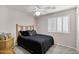 Cozy bedroom with a window allowing natural light to filter in, creating a serene atmosphere at 5046 W Monte Cristo Ave, Glendale, AZ 85306