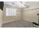 Bedroom with a window allowing natural light to filter in, creating a serene atmosphere at 5046 W Monte Cristo Ave, Glendale, AZ 85306
