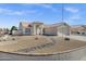Charming single-story home with a well-maintained yard, decorative rock landscaping and a two car garage at 5046 W Monte Cristo Ave, Glendale, AZ 85306
